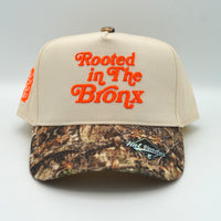 "Rooted in the Bronx" Snapback Camo / Creme / Orange