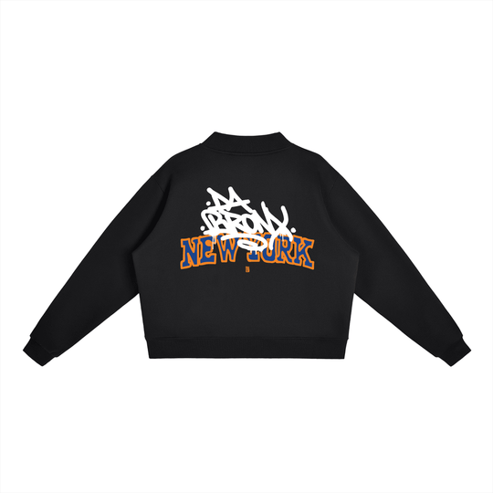 Black cropped hoodie with Bronx graffiti art and bold New York lettering, NYC streetwear style