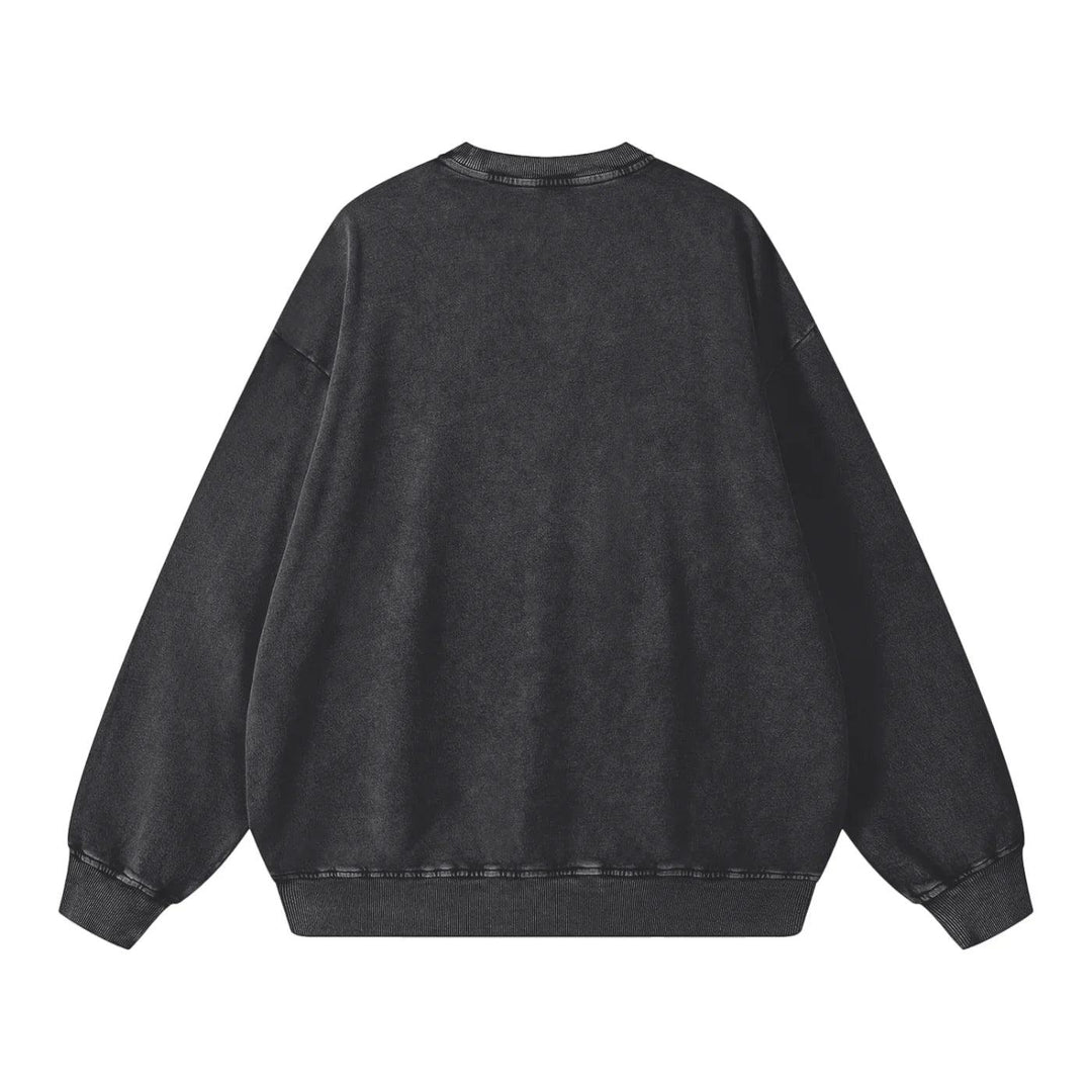 Black oversized acid wash crewneck sweatshirt with ribbed cuffs and hem, streetwear style