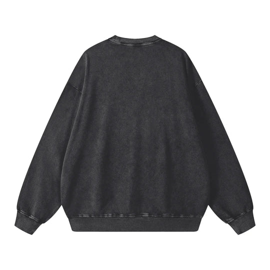 Black oversized acid wash crewneck sweatshirt with ribbed cuffs and hem, streetwear style