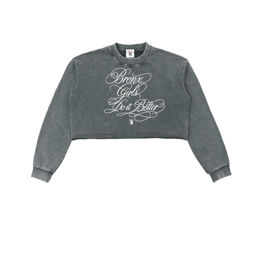 Gray cropped hoodie with 'Bronx Girls Do It Better' script text, NYC streetwear style