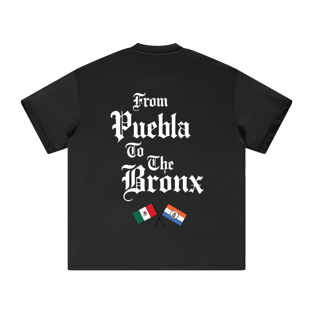 Black t-shirt with 'From Puebla To The Bronx' text and crossed flags design