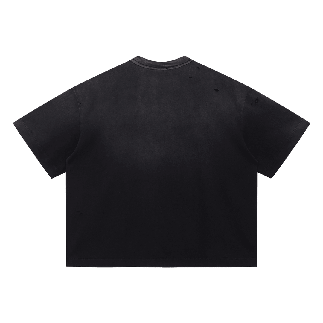 Black distressed crop tee with ripped details, bold streetwear style for urban fashion