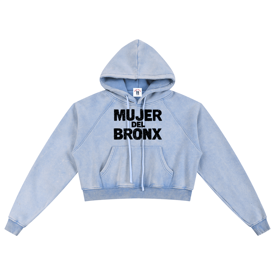 Light blue cropped hoodie with 'MUJER DEL BRONX' print, NYC streetwear style