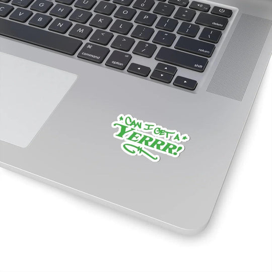Green 'Can I Get a YERRR!' sticker on laptop, bold NYC streetwear style