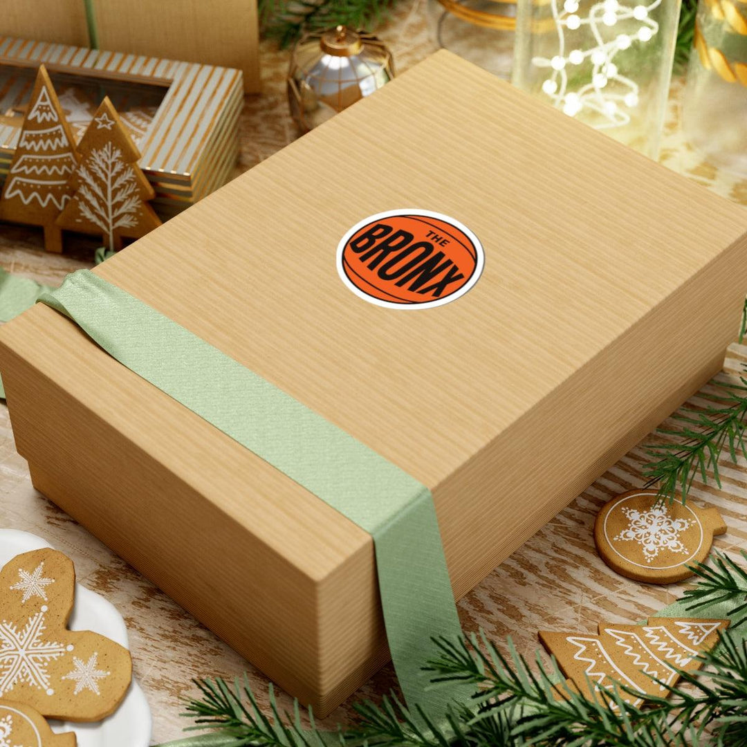 Gift box with 'The Bronx' sticker, festive gingerbread cookies, and holiday decor