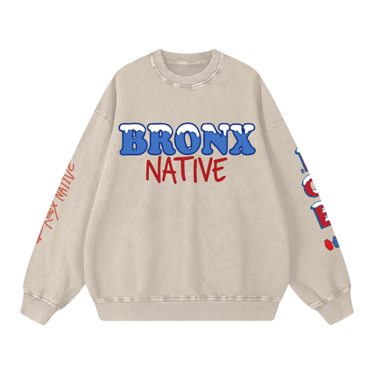 Beige sweatshirt with 'Bronx Native' text in blue and red on a white background