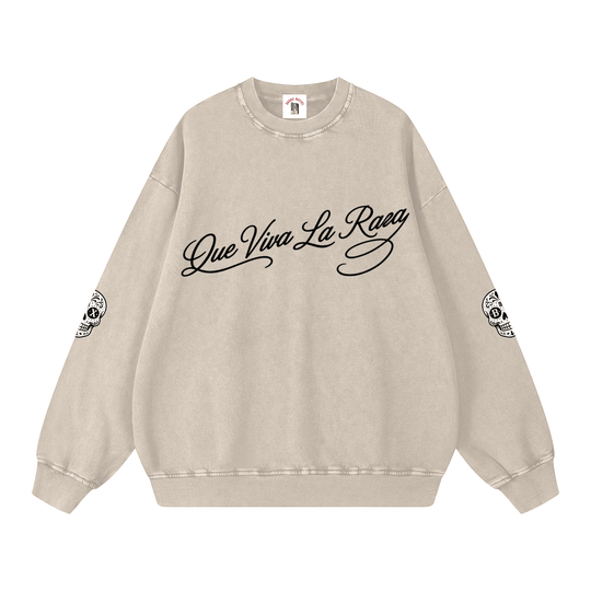 Beige sweatshirt with 'Que Viva La Raza' text and graphic designs on a white background