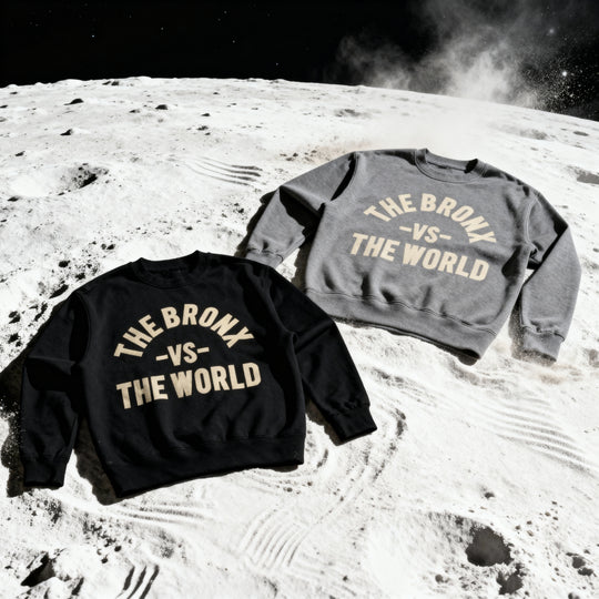 Two sweatshirts with 'The Bronx vs The World' text on a lunar surface background