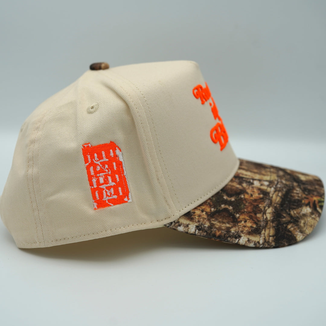 "Rooted in the Bronx" Snapback Camo / Cream / Orange