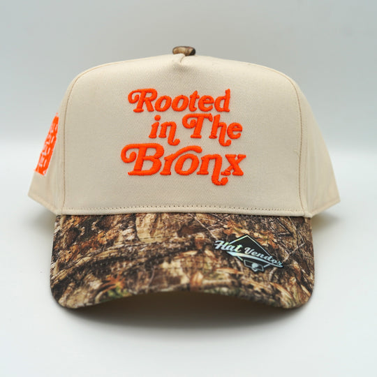 "Rooted in the Bronx" Snapback Camo / Cream / Orange