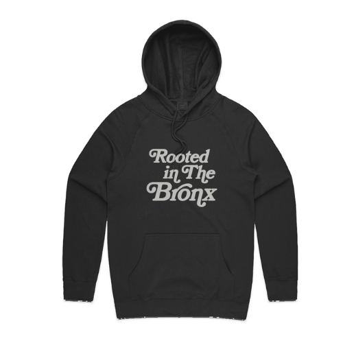 Black hoodie with 'Rooted in The Bronx' text on a white background