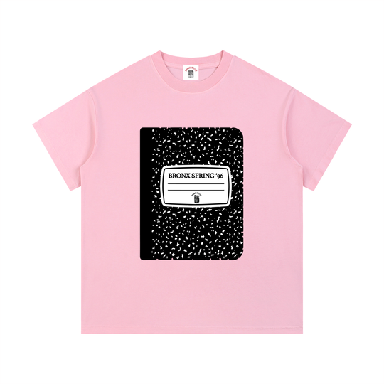 Pink t-shirt with a black and white graphic design on a white background